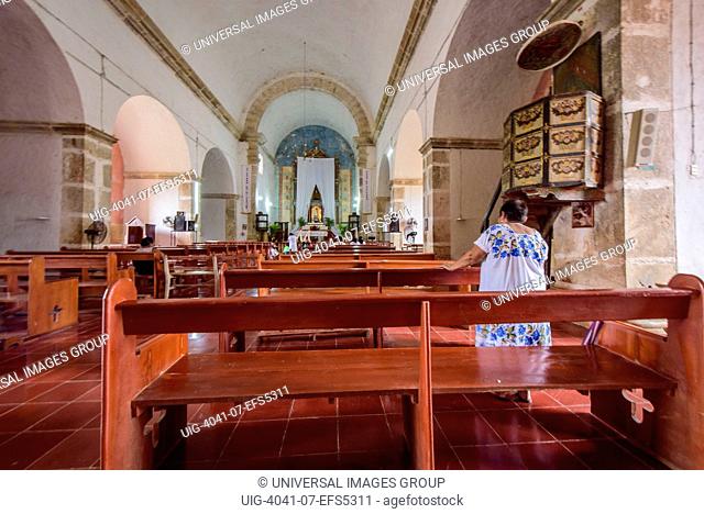 Women praying in the church of the convent of Mama, Yucatan, Mexico