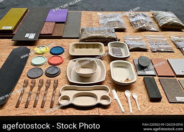 02 May 2022, Brandenburg, Schwedt: At the start of the bioeconomy tour, various developments and products made from renewable and recycled materials can be seen...