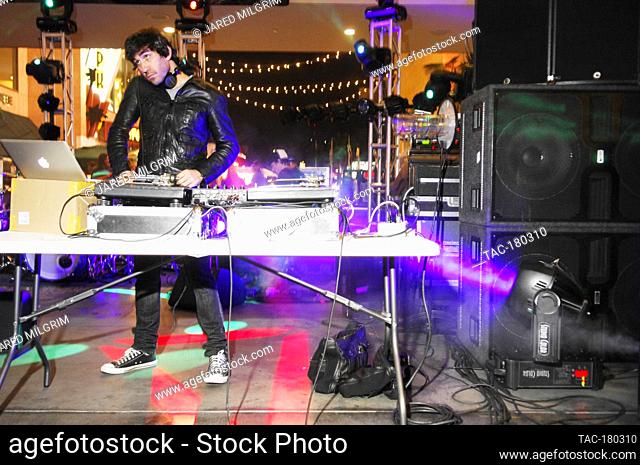 Brent Bolthouse spins a DJ set before Scott Weiland performs songs from his new solo CD at the Hollywood and Highland food court on November 24