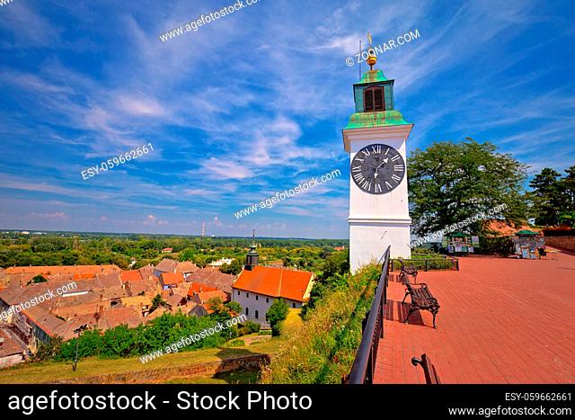 Petrovaradin clock tower and rooftops on Danube coast view, Novi Sad in Vojvodina region of Serbia