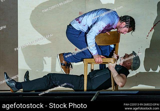 11 May 2022, Hamburg: Daniel Hoevels (as Mikhail, above) and Paul Herwig (as Sasha) stand on the stage of the Deutsches Schauspielhaus during the photo...