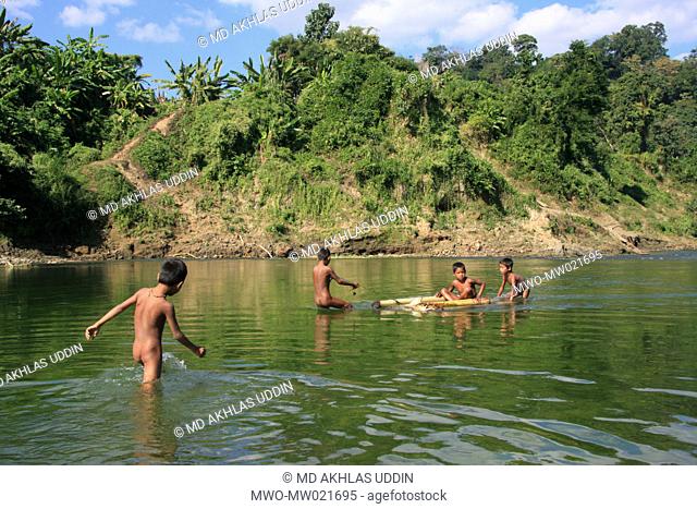 Children playing in the Sangu river in Thanchi in Bandarban, Bangladesh December 2, 2009