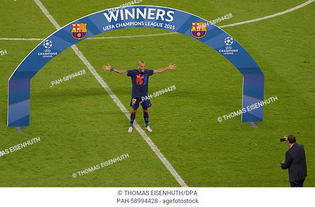 Barcelona's Dani Alves celebrates after the UEFA Champions League final soccer match between Juventus FC and FC Barcelona at Olympiastadion in Berlin, Germany