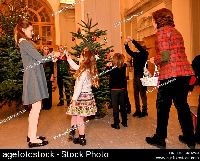 STOCKHOLM 20231218 Queen Silvia was joined by her granddaughters: Princess Estelle and Princess Adrienne when they received and decorated the Royal Palace's...