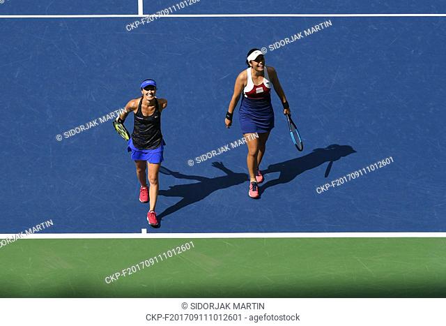 From left Martina Hingis, of Switzerland and Chan Yung-Jan, of Taiwan celebrate a victory after the final of the U.S. Open tennis tournament in New York, USA