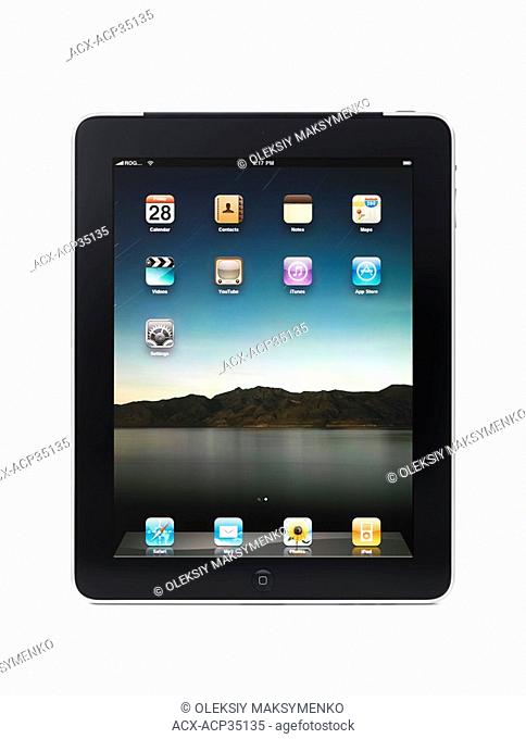 Apple iPad 3G tablet with desktop icons on its display isolated on white background with clipping path