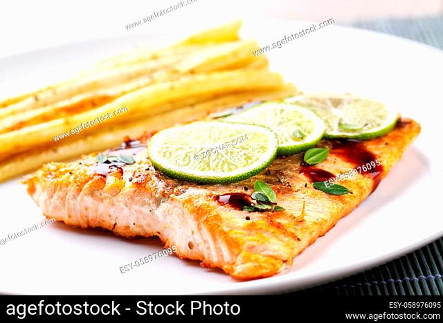 Salmon Fillet with Asparagus, Lime and Balsamic Sauce. High photo quality