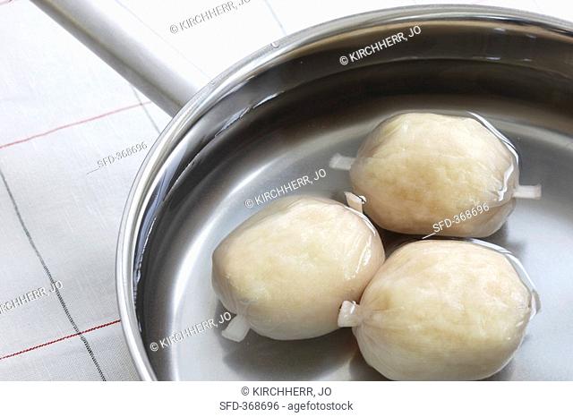 Dumplings ready-made product in water