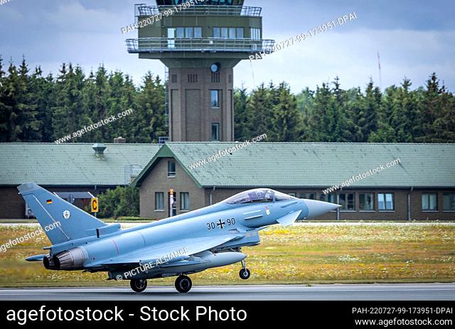 27 July 2022, Mecklenburg-Western Pomerania, Laage: A Eurofighter takes off from the air base for a flight toward Estonia..