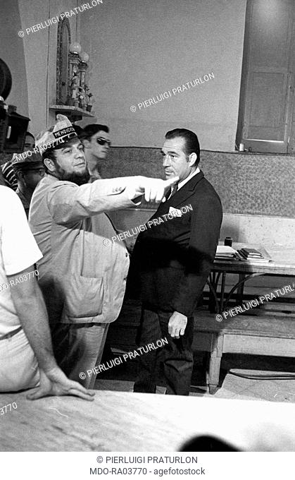 Italian director Marco Ferreri directing Italian actor Ugo Tognazzi on the film set of The Ape Woman. 1963