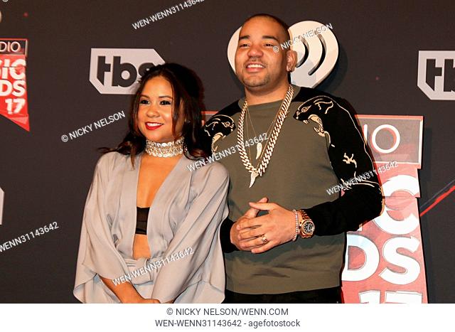 Angela Yee and DJ Envy attending the 2017 iHeartRadio Music Awards at The Forum in Inglewood, California. Featuring: Angela Yee, DJ Envy Where: Inglewood