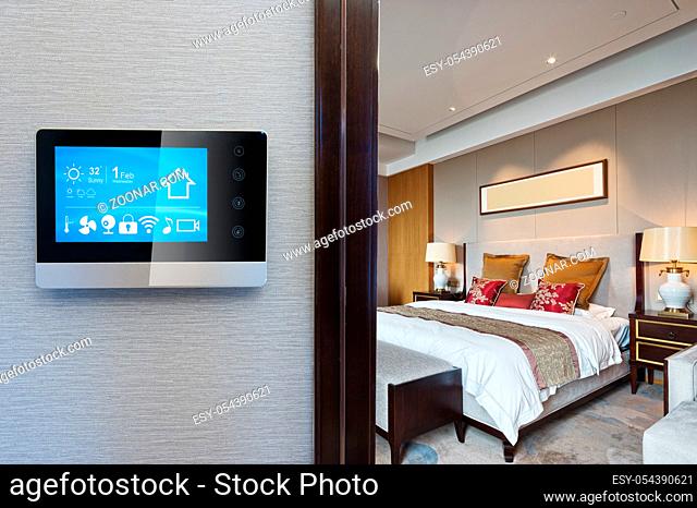 digital screen on wall with modern bedroom