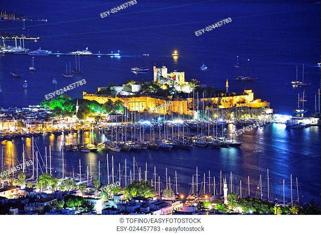 View of Bodrum harbor and Castle of St. Peter by night. Turkish Riviera