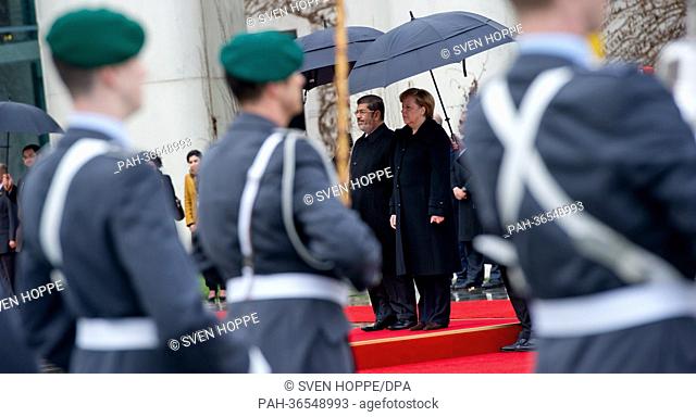 German Chancellor ANgela Merkel receives President of Egypt Mohamed Morsi with military honours in Berlin, Germany, 30 January 2013