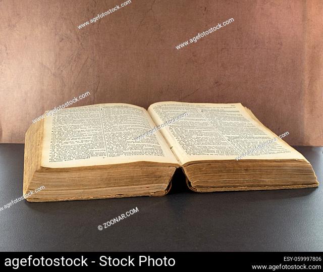 old bible book with brown background