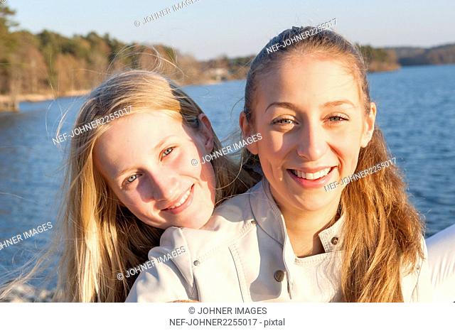Portrait of smiling sisters