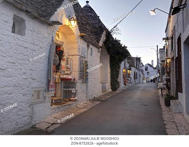 street in the trulli district Rione Monti in Alberobello, Puglia, Italy