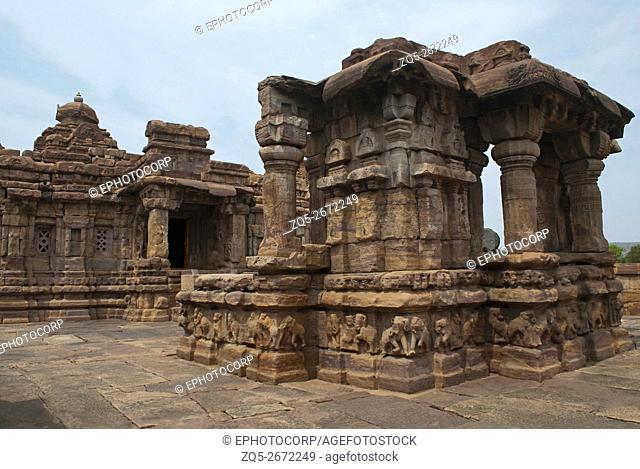 Open Nandi mandapa and entrance to the Mallikarjuna Temple, Pattadakal temple complex, Pattadakal, Karnataka, India. The elephants in the adhishthana in...