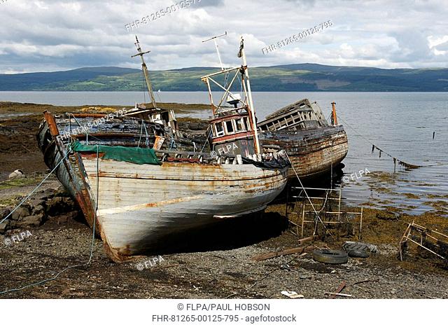 Abandoned trawlers, beached on shore, Salen Bay, Isle of Mull, Inner Hebrides, Scotland