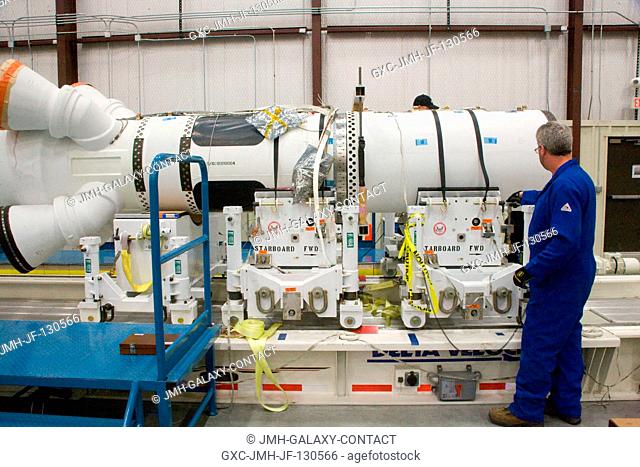 Technicians work on the Pad Abort-1 (PA-1) flight test vehicle at the U.S. Army's White Sands Missile Range in New Mexico