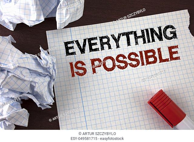 Word writing text Everything Is Possible. Business concept for All you think or dream can become true Optimistic written Tear Notebook Paper wooden background...