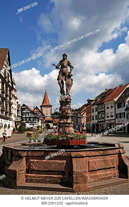 Statue of a knight on Roehrbrunnen fountain, coat of arms on the shield, 1582, by Max Spranger from Strasbourg, Haigeracher Tor gate from the 17th century at...