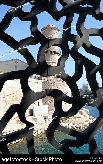 Fort Saint-Jean, view through the net-like concrete structure of the MuCEM, Museum of European and Mediterranean Civilisations, Marseille