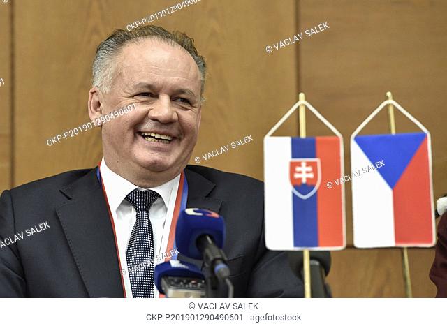 Andrej Kiska (pictured), president of the Slovak Republic, receives a Great gold medal of Masaryk University from (MUNI) Rector Mikulas Bek (not pictured)...