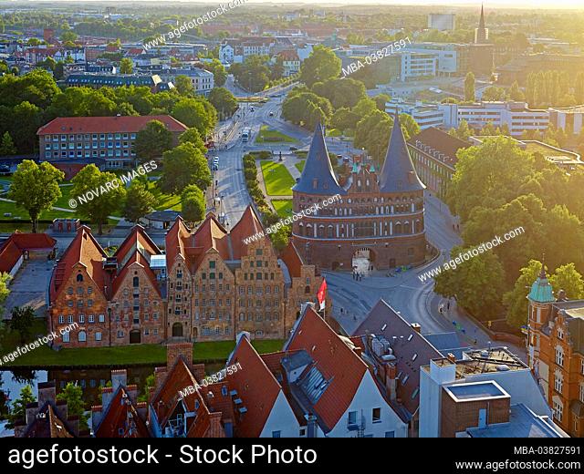 View of the salt reservoir and Holstentor on the river Trave, Hanseatic City of Lbeck, Schleswig-Holstein, Germany