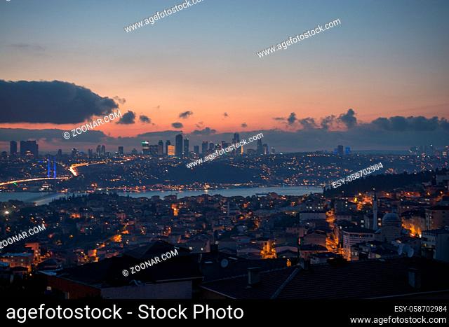 Istanbul cityscape below clouds during the evening