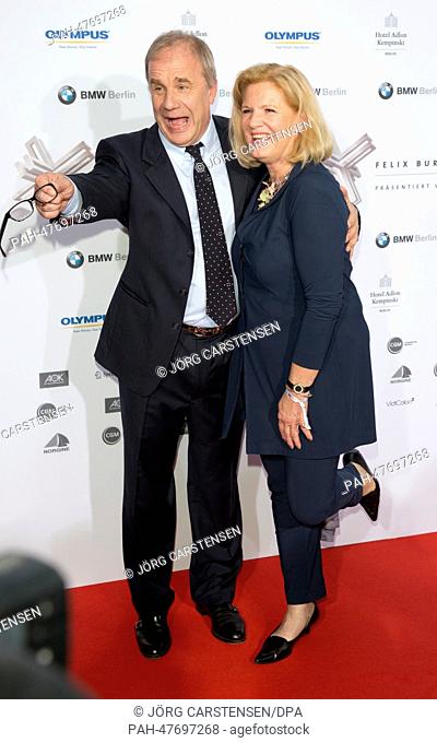 Hubertus Meyer-Burckhardt (L) and Dorothee Roehrig arrive for the Felix Burda Award 2014 ceremony at Hotel Adlon in Berlin, Germany, 6 April 2014