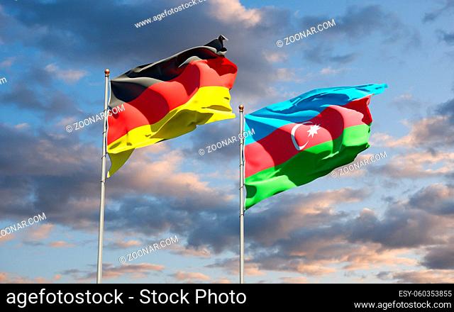 Beautiful national state flags of Germany and Azerbaijan together at the sky background. 3D artwork concept