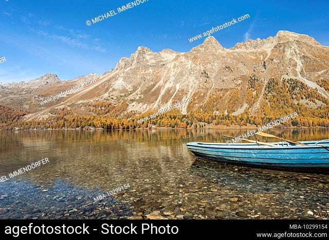 Switzerland, Graubünden, Engadin, Oberengadin, Sils, Silser See, blue rowing boat on the shore