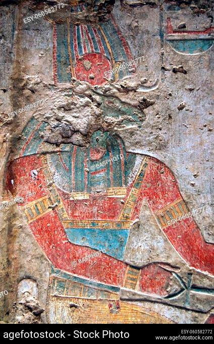 An ancient egyptian carved and painted relief of the ram headed god Khnum. On an inside wall of the temple of Beit al-Wali on the shores of Lake Nasser near...