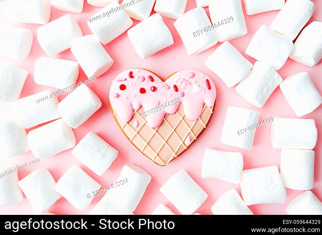 Melt ice cream heart gingerbread cookie, marshmallow. Valentine. Pink background. High quality photo