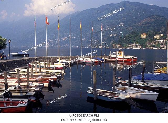 Switzerland, Ticino, Ascona, Boats docked in the harbor along the lakefront of Lake Maggiore in the city of Ascona