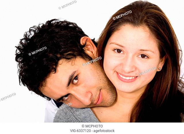 beautiful and cute couple portrait where both are smiling over a white background - 26/08/2007
