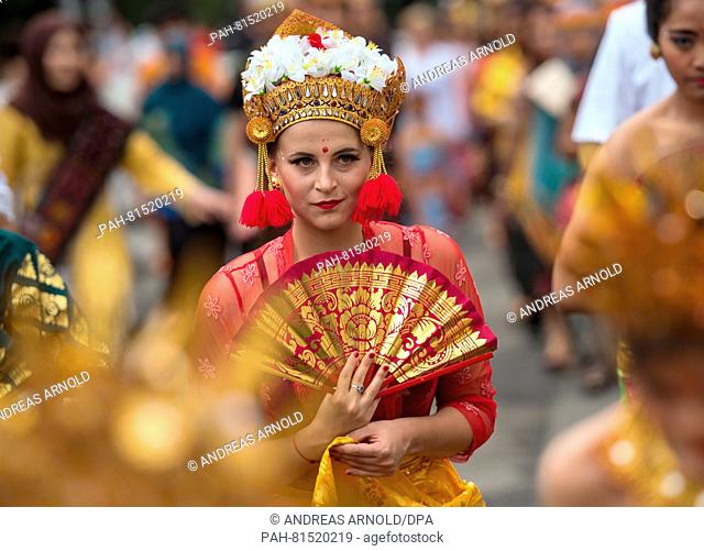 A dancer of the group 'Permif"" (an Indonesian association from Frankfurt) posing with traditional clothes during the 'Parade der Kuklturen' ('Parade of...