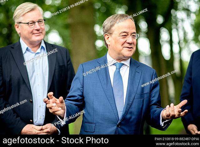 18 August 2021, Lower Saxony, Gyhum: Armin Laschet (M), candidate for chancellor of the CDU/CSU and chairman of the CDU, speaks at an election campaign event at...