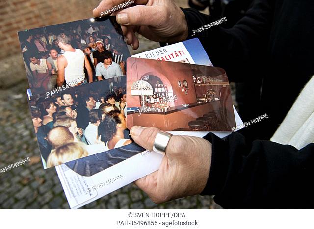 Peter Ambacher, friend of Freddie Mercury, shows photographs of a party at the ""Frisco Bar"" during a tour of the Queen singer Freddy Mercury's old haunts in...