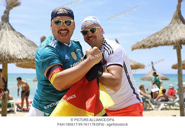 17 June 2018, Spain, Palma de Mallorca: The German Fans Rolf and Horst before the soccer World Cup game between Germany and Mexico at Arenal beach in Palm de...