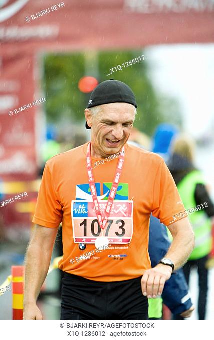 2009 Reykjavik Marathon, Johann Nuber from Germany at the finish line, runner in half-marathon  Reykjavik Iceland