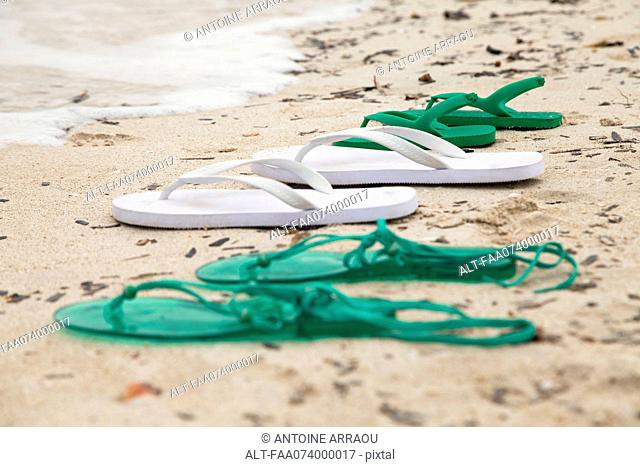 Sandals left on beach