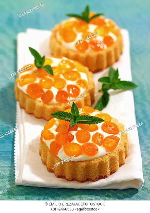 Tartlets with cheese and kumquats