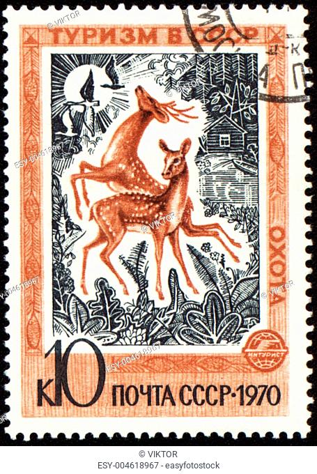 Playing deers on post stamp