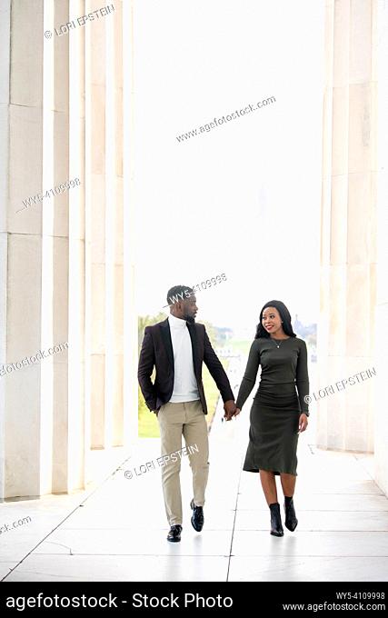 A young Nigerian couple visits the National Mall in Washington, D. C. to celebrate their engagement
