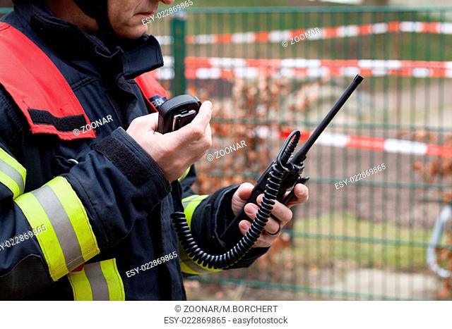 Firefighter with walkie-talkie