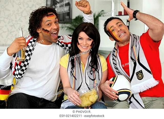 Football fans cheering on the German team