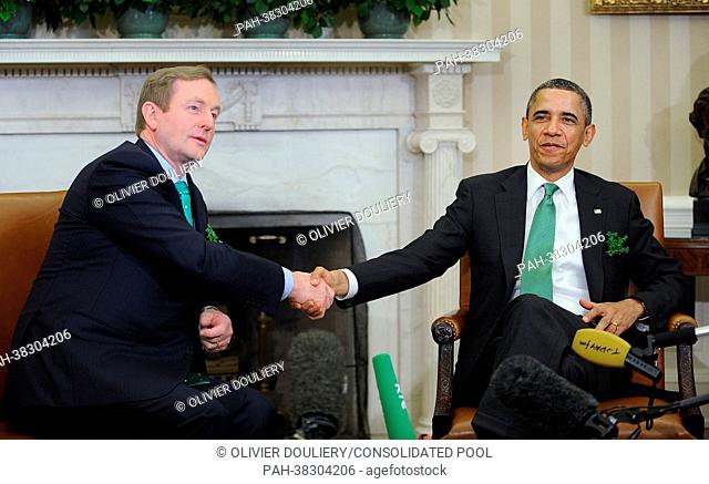 United States President Barack Obama (R) meets Irish Prime Minister Enda Kenny in the Oval Office of the White House in Washington, DC