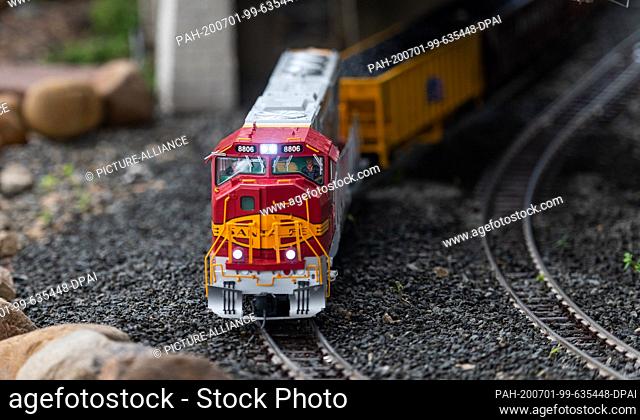 01 July 2020, Lower Saxony, Bispingen: A train runs over the model railway layout. A total of 500 trains are to roll through various theme worlds on an initial...